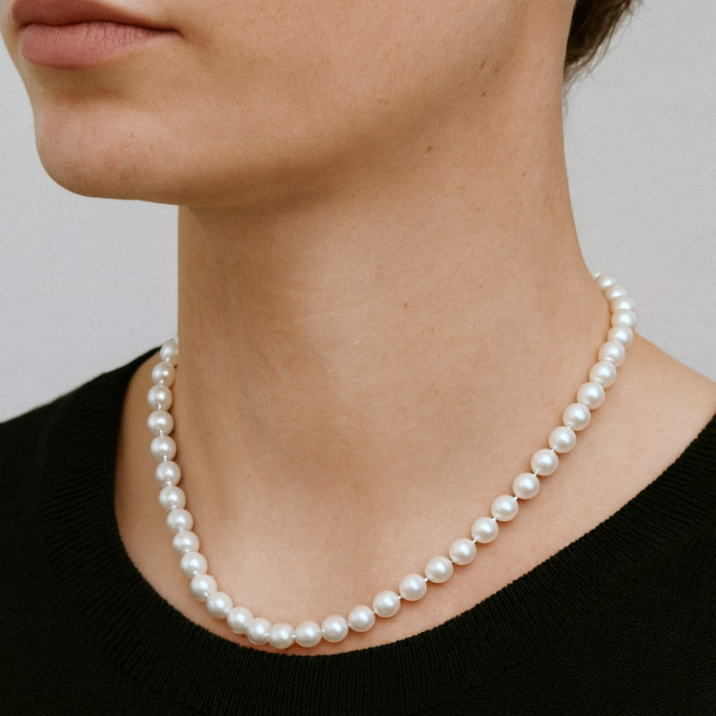 Freshwater pearl necklace worn