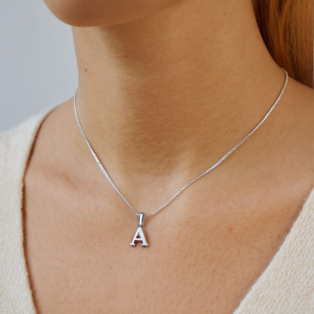 Silver Initial Necklace, Letter Pendant in 925 Sterling Silver, worn on model for scale