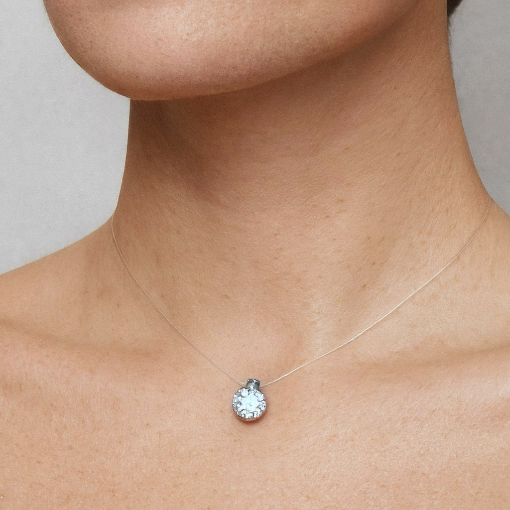 Floating Moissanite Necklace, Invisible Illusion Chain with Sterling Silver Solitaire, worn on model for scale