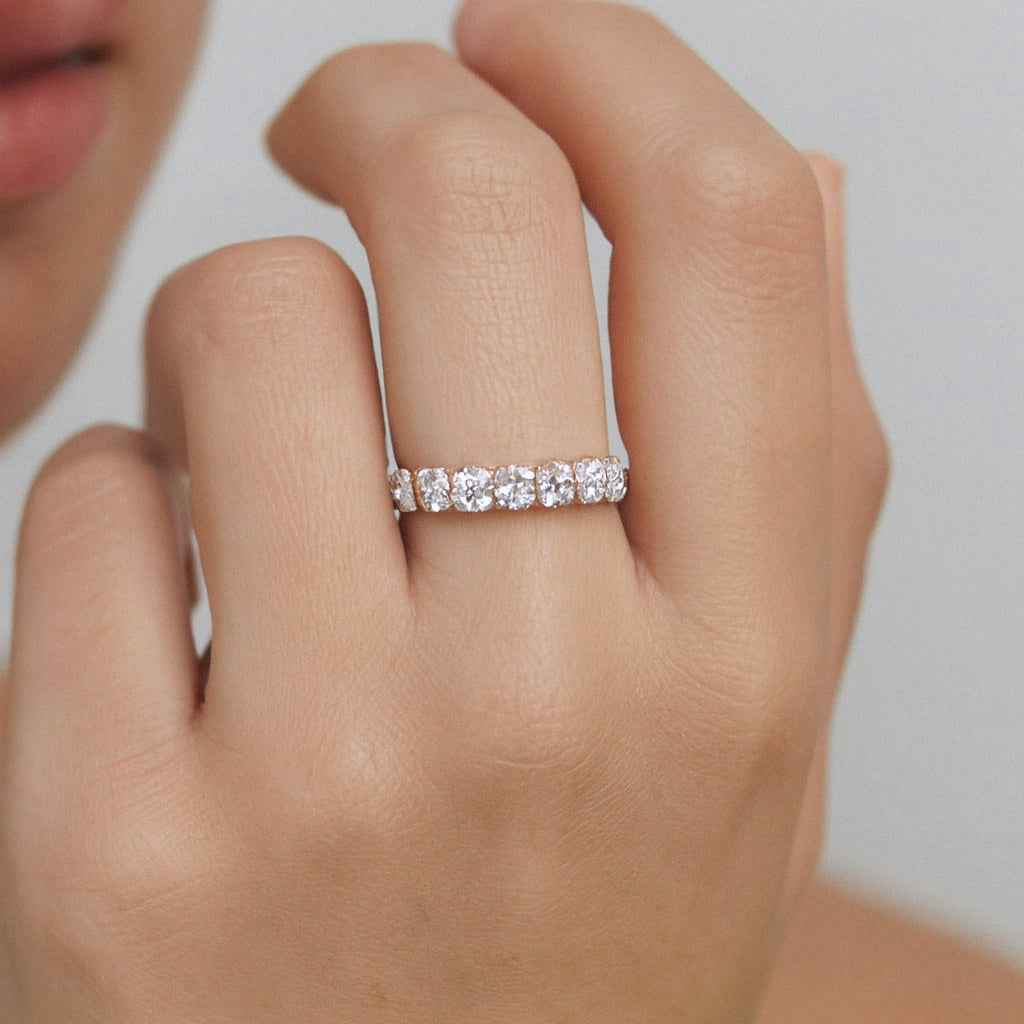 Oval Moissanite Eternity Ring, Full Eternity Band in 925 Sterling Silver, worn on model for scale