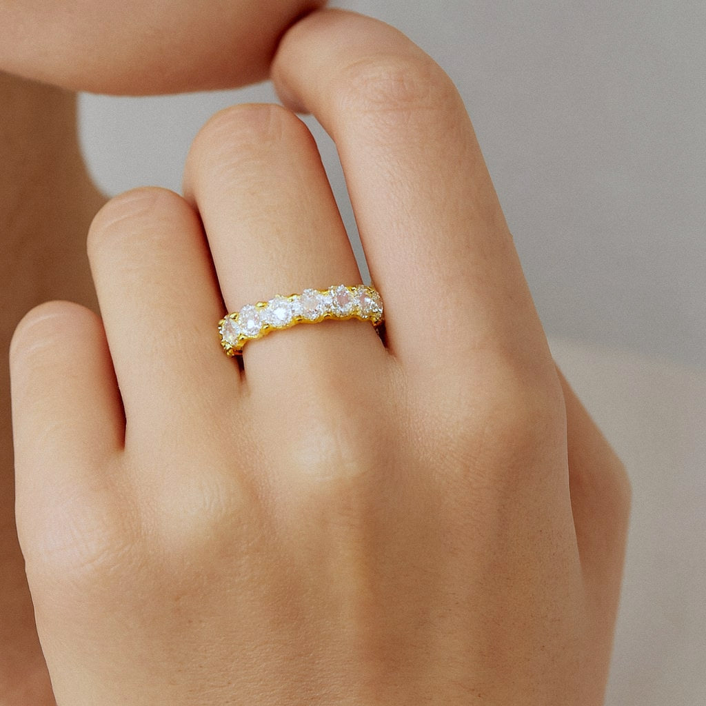 Gold Oval Moissanite Eternity Ring, 18k Gold Plated Sterling Silver Eternity Band, worn on model for scale