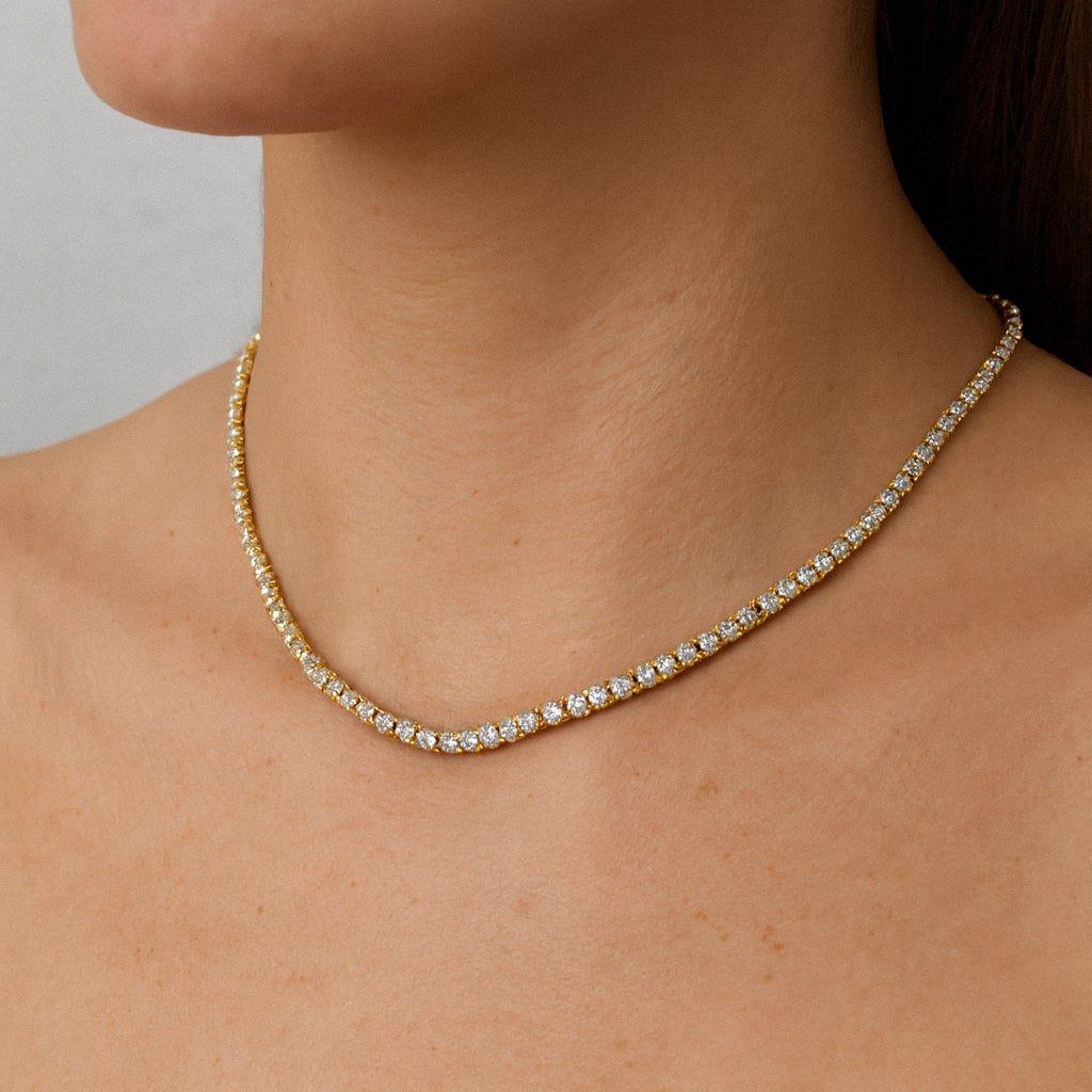 Gold moissanite tennis necklace worn
