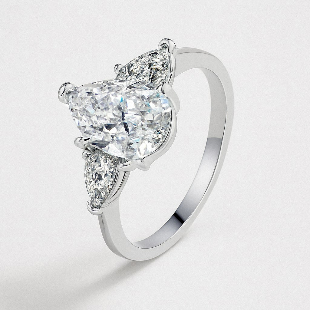 Pear Moissanite Ring, Pear Cut with Side Stones in 925 Sterling Silver, product view