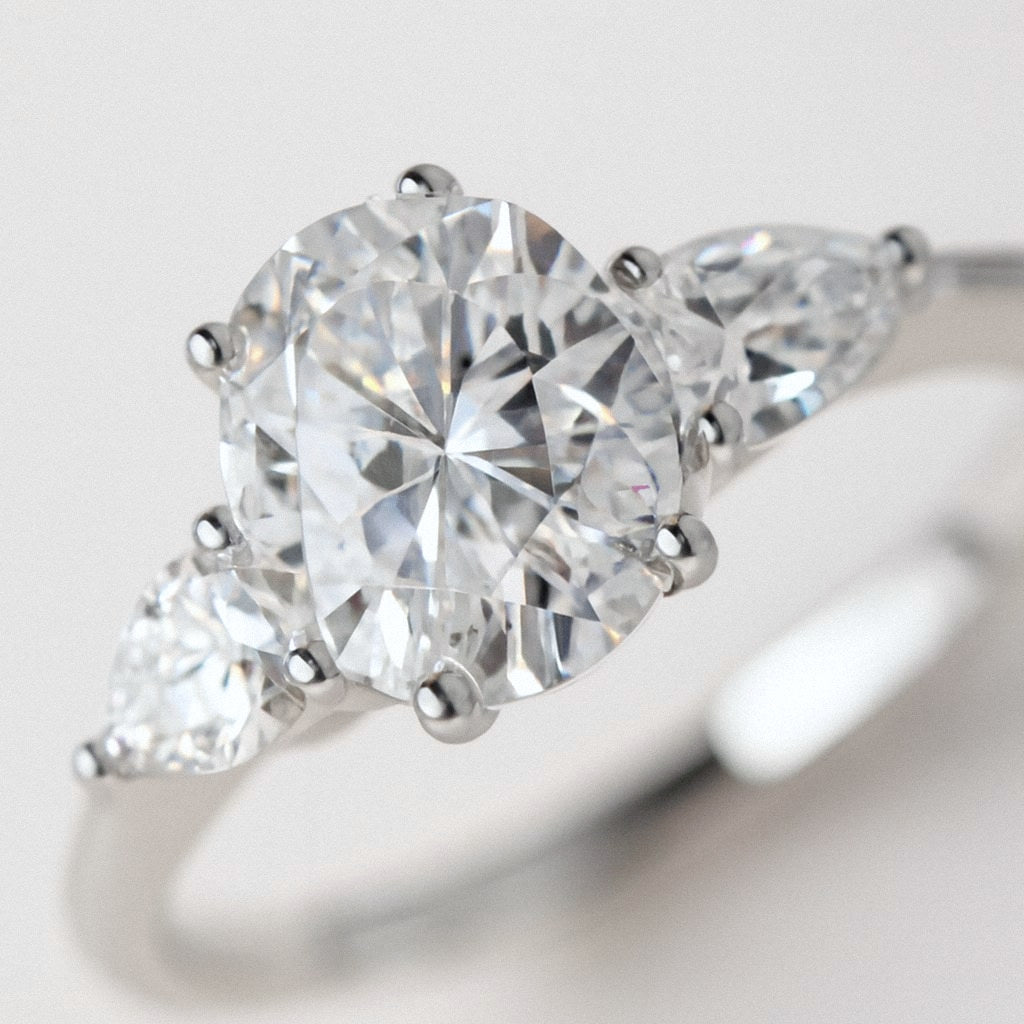 Three Stone Moissanite Ring, Oval Trilogy Ring in 925 Sterling Silver, close-up detail
