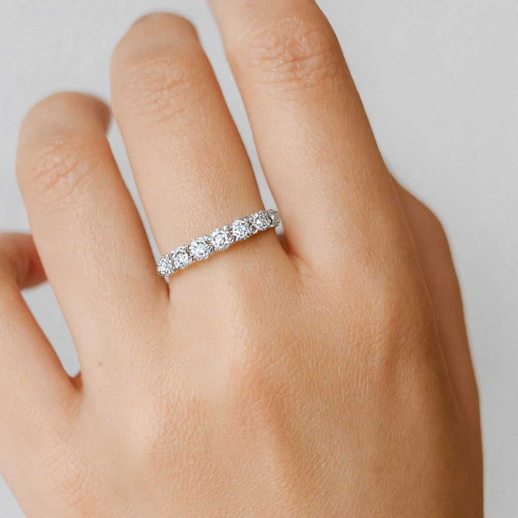 Seven Stone Moissanite Stacking Ring, 925 Sterling Silver, worn on model for scale