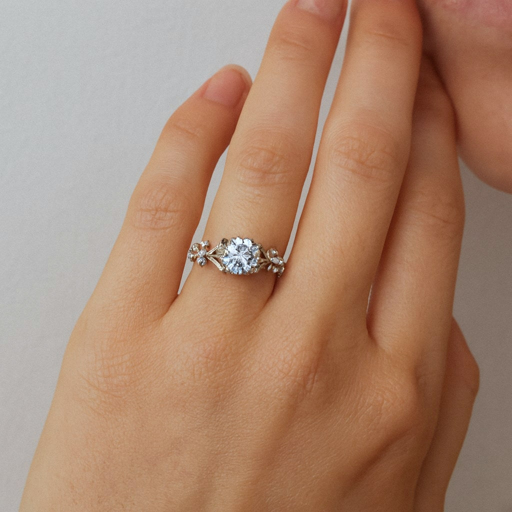 Laurel Leaf Moissanite Ring, Botanical Solitaire in 925 Sterling Silver, worn on model for scale