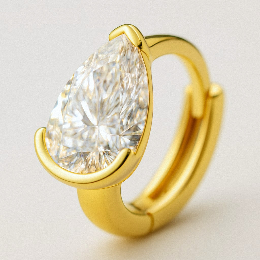 Gold Pear Moissanite Huggie Earrings, 18k Gold Plated Sterling Silver, close-up detail