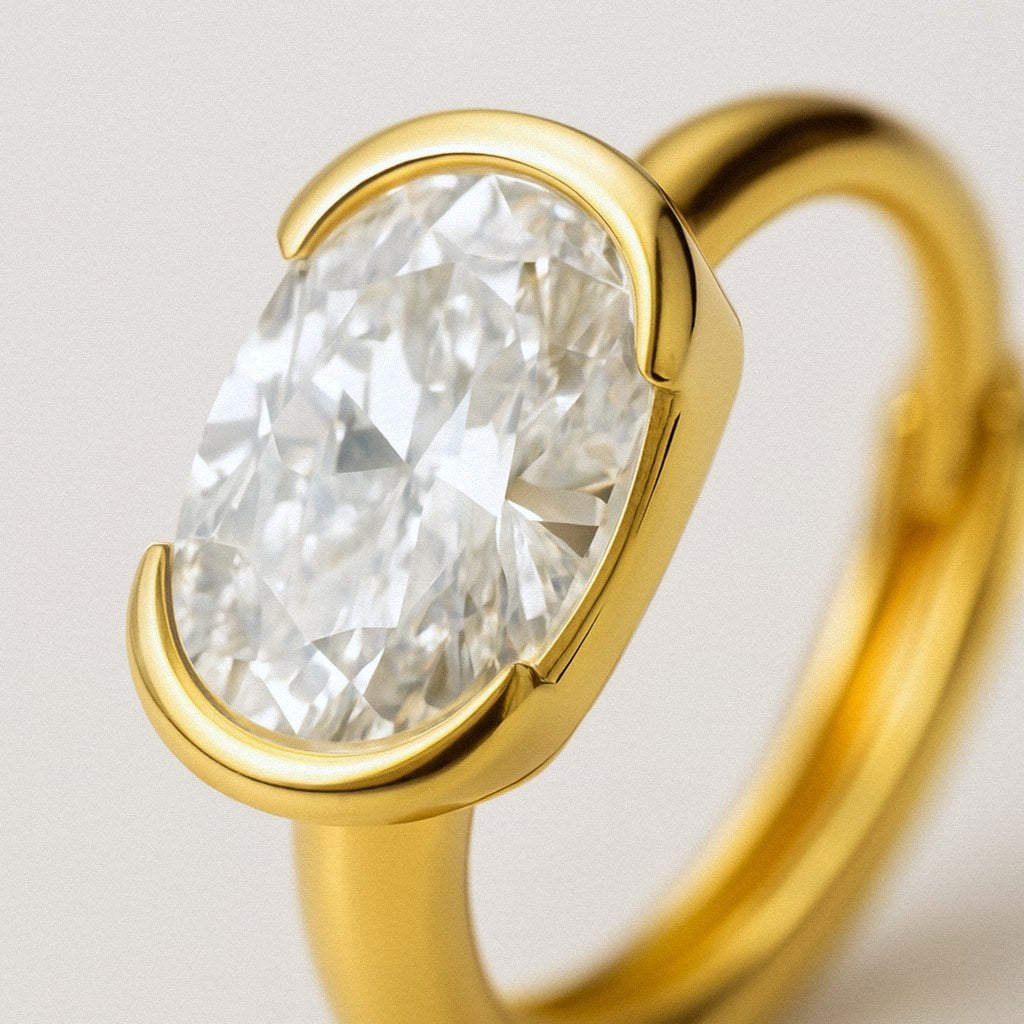 Gold Oval Moissanite Huggie Earrings, 18k Gold Plated Sterling Silver, close-up detail