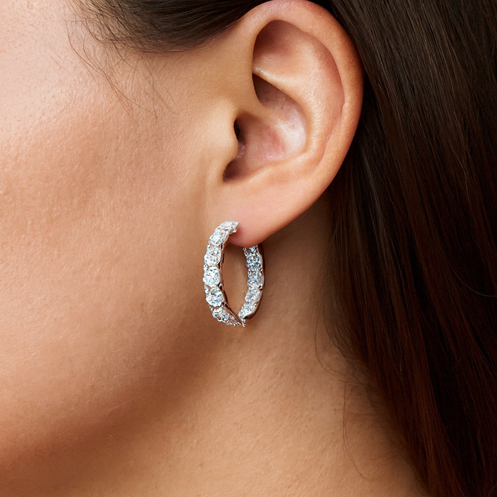 Pavé Hoop Earrings, Inside-Out Moissanite Hoops in 925 Sterling Silver, worn on model for scale