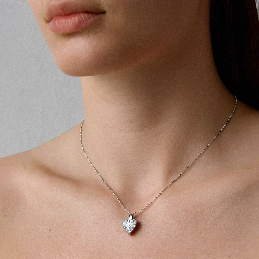 Heart Moissanite Necklace, Heart Solitaire Pendant in 925 Sterling Silver, worn on model for scale