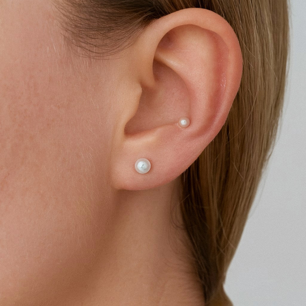 Tiny Pearl Stud Earrings, 3mm to 6mm Freshwater Pearl Studs, Sterling Silver Posts, worn on model for scale