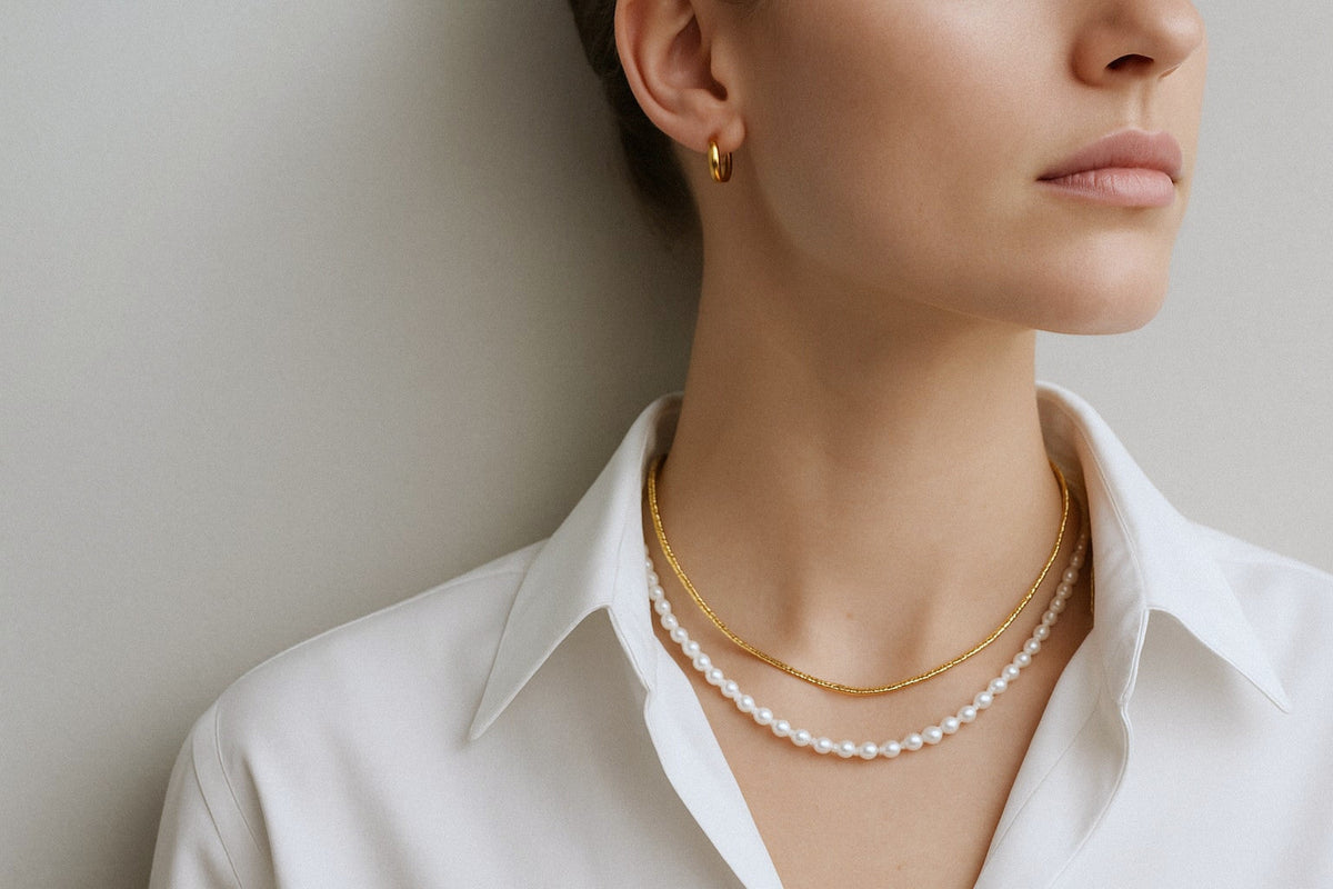 Vaudelle fine jewellery, gold and pearls worn together