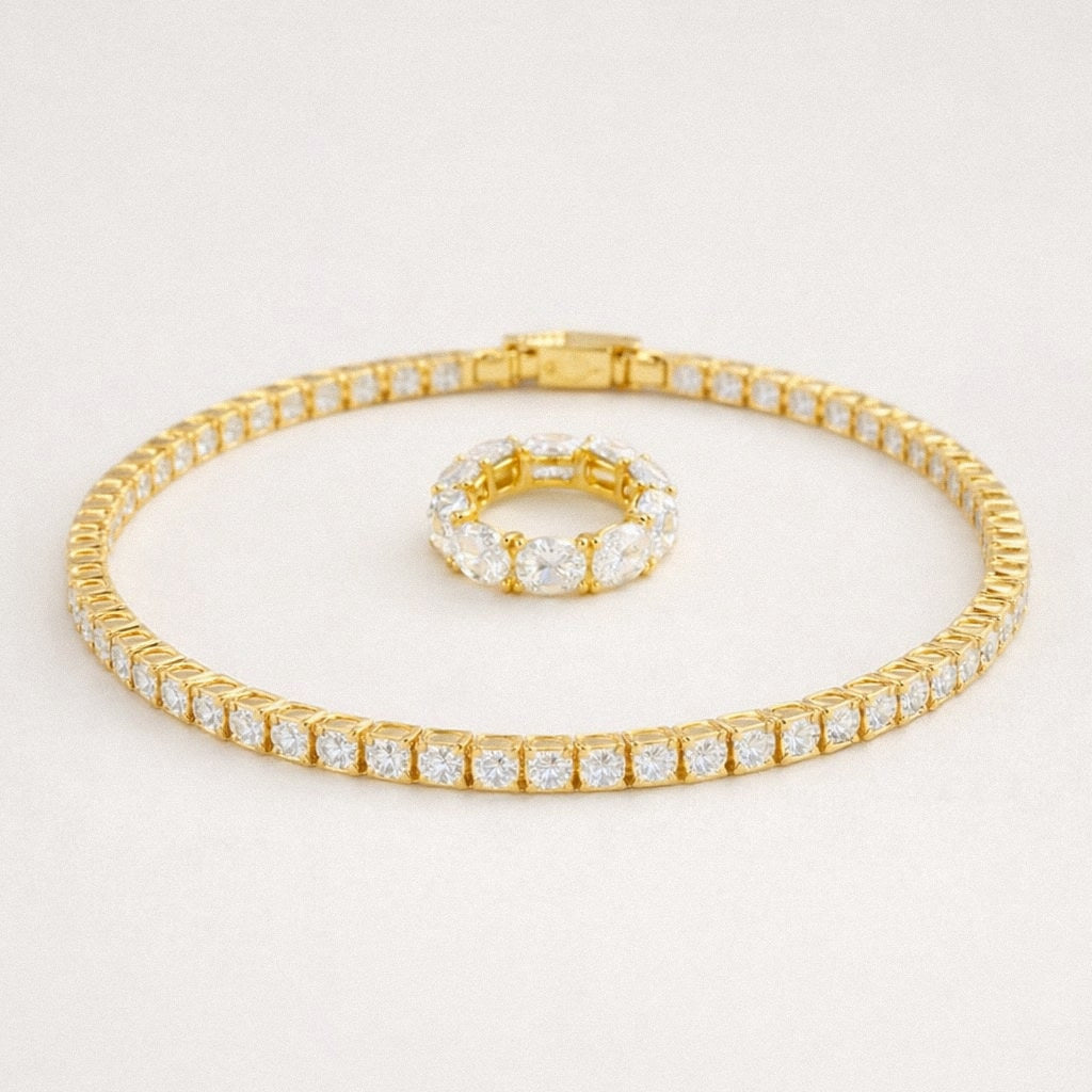 Gold oval moissanite eternity ring and gold moissanite tennis bracelet set