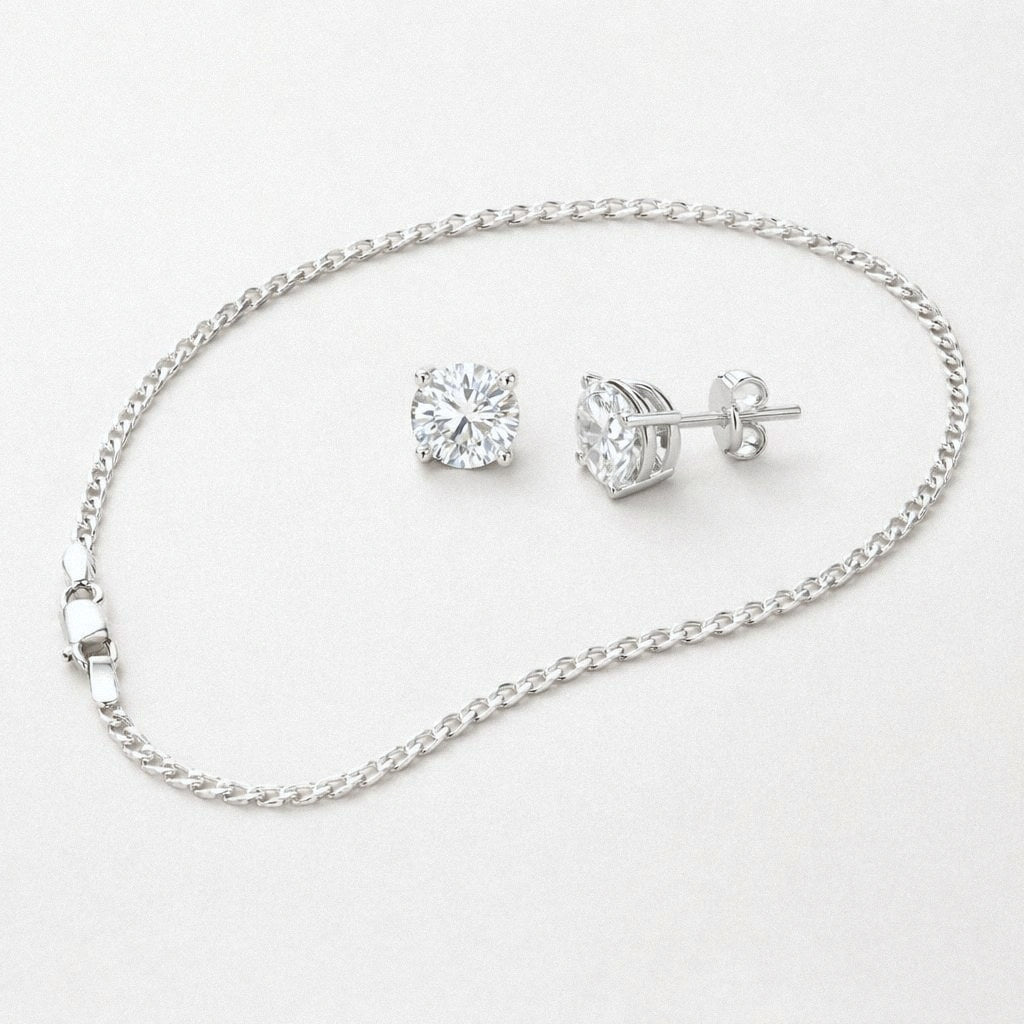Silver Cuban chain necklace and four-prong moissanite stud earrings set