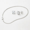 Silver Cuban chain necklace and four-prong moissanite stud earrings set