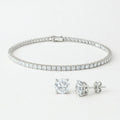 Silver moissanite tennis bracelet and four-prong moissanite stud earrings set