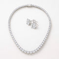 Silver moissanite tennis necklace and four-prong moissanite stud earrings set